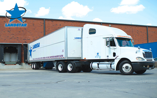 Owner-operator loading trailer with freight.