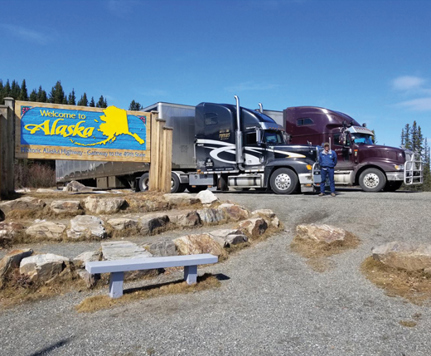 Owner-operators parked with trucks.